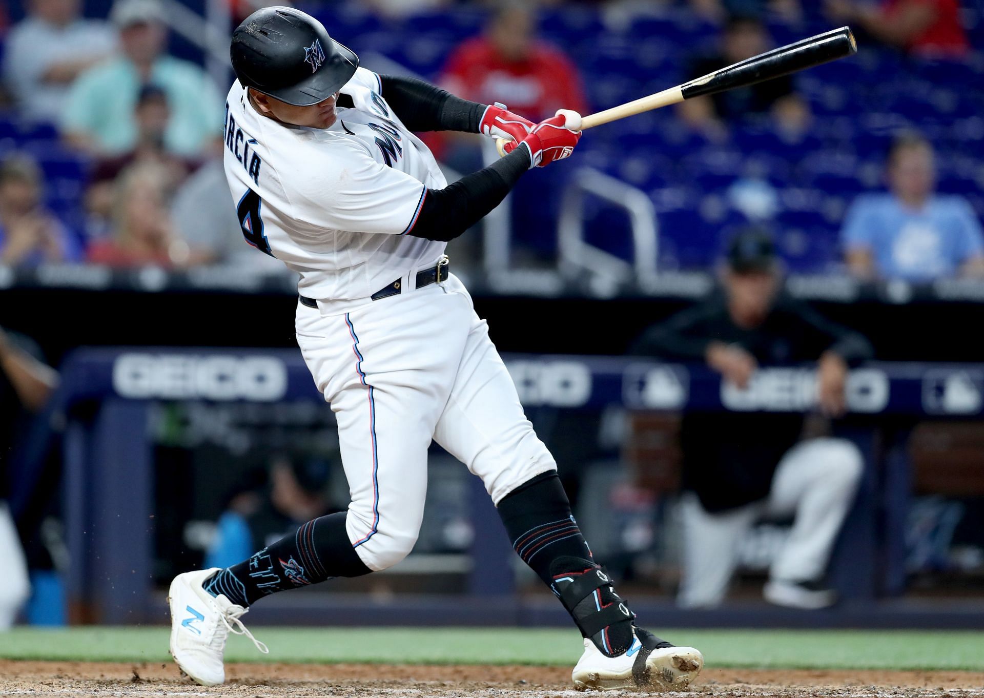 Avisail Garcia bats during a Colorado Rockies v Miami Marlins game.